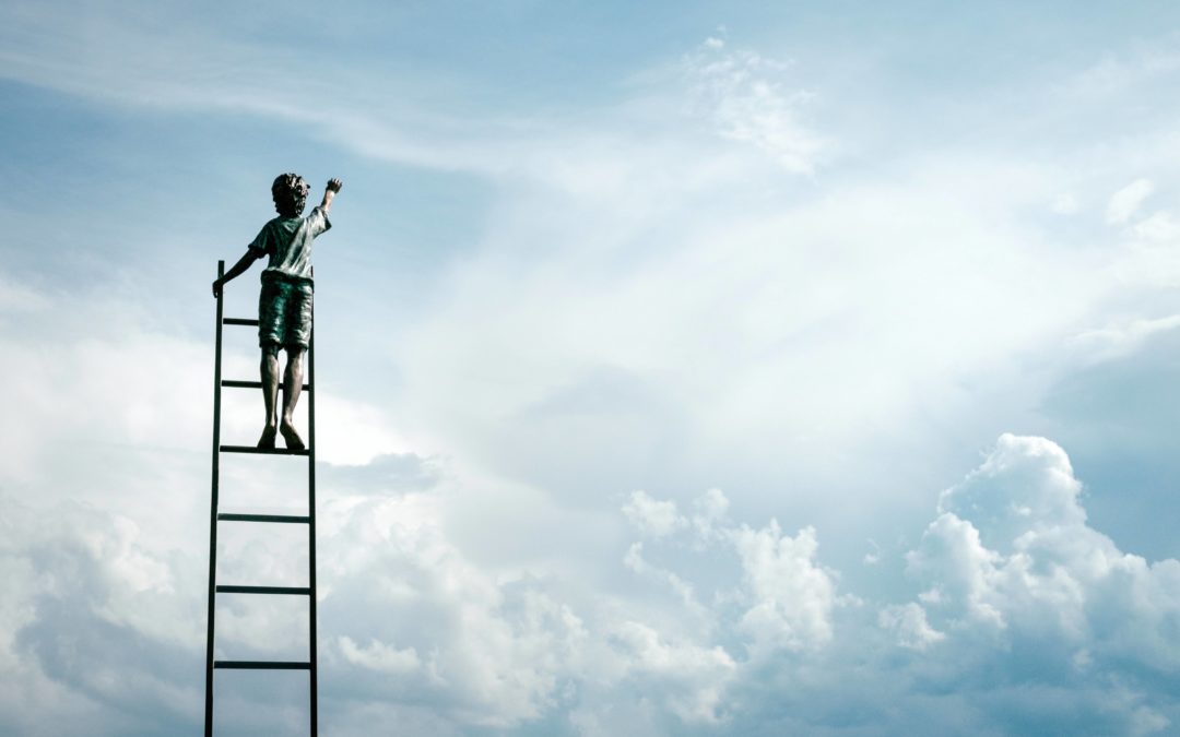 "That Kind of Person" Photo of a boy standing at the top of a tall ladder and reaching up with one hand with only the cloud-filled sky as the background