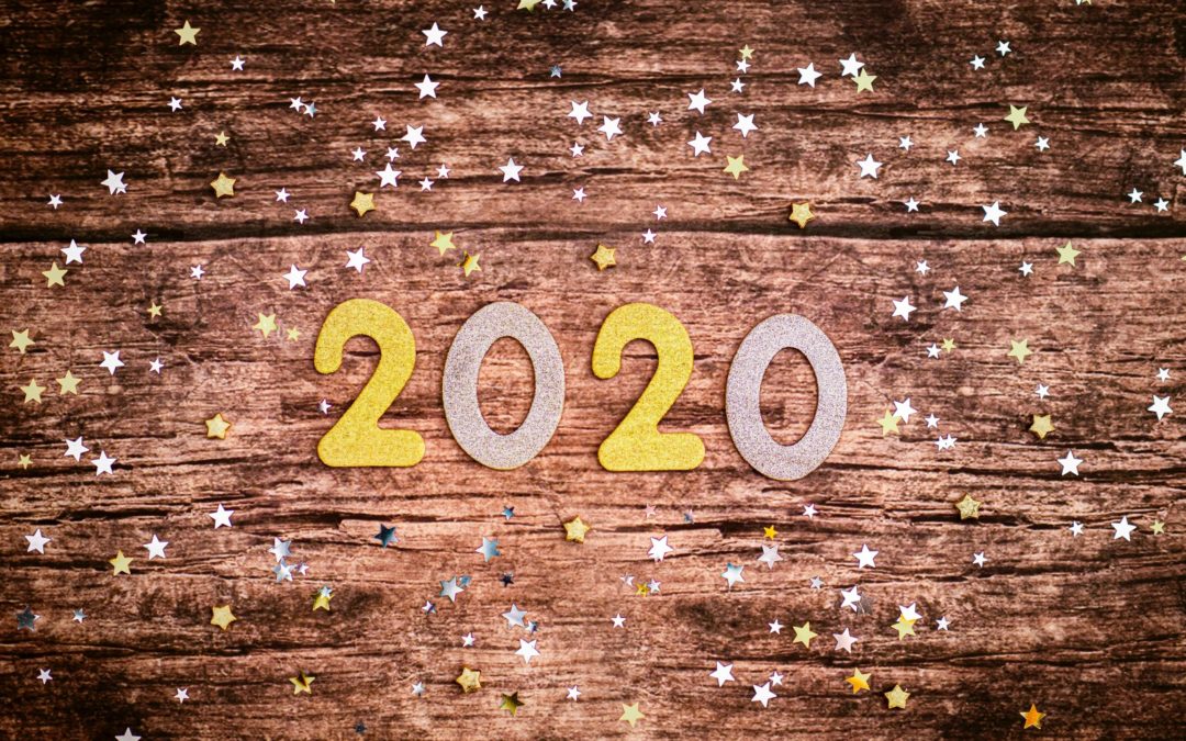 2020 spelled out on a wood background