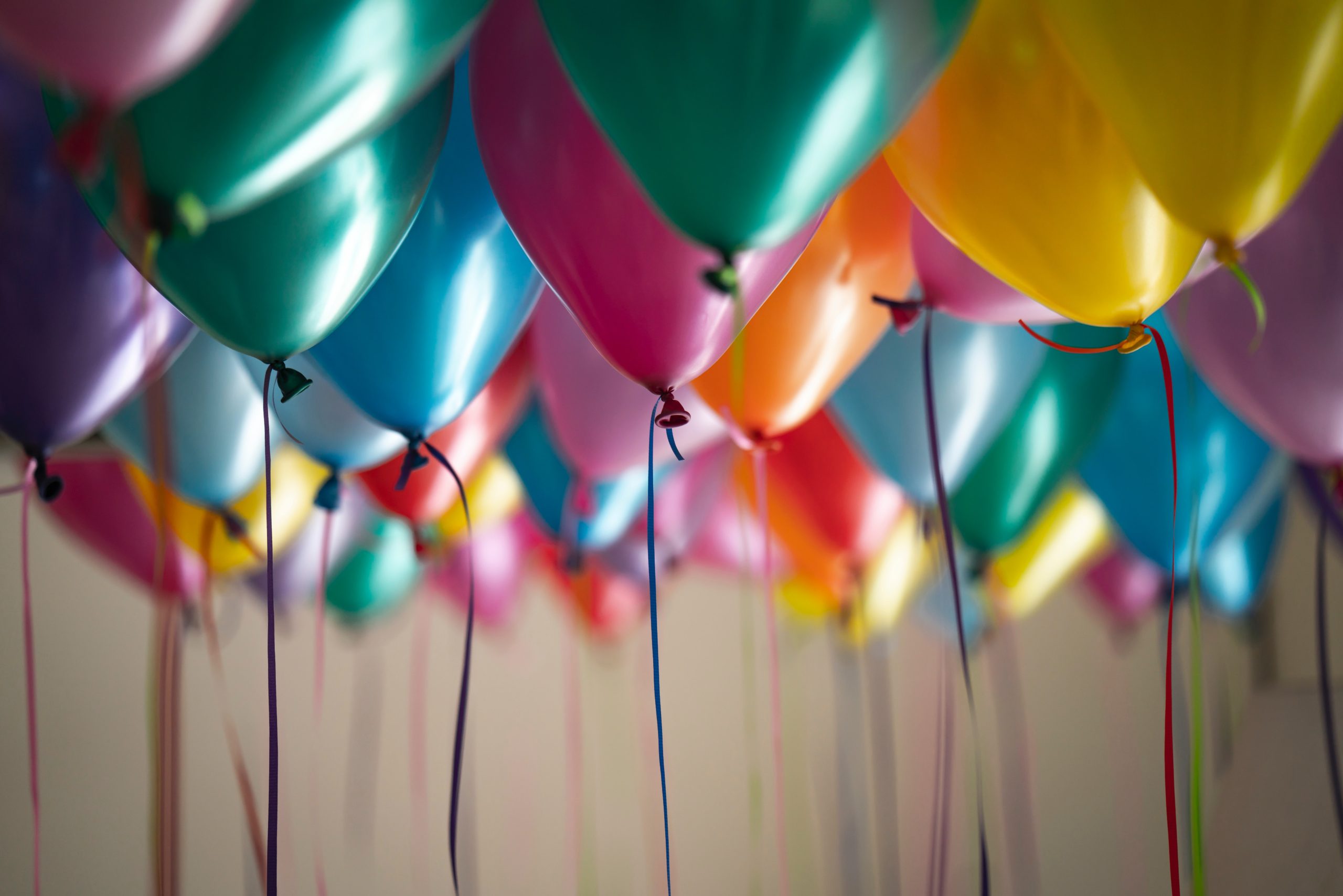 Image of many brightly coloured balloons